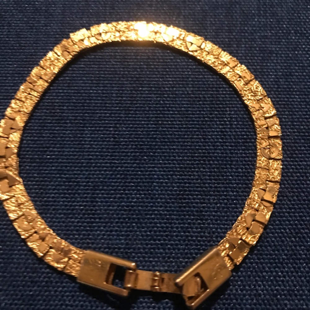 Te Amo gold bracelet.